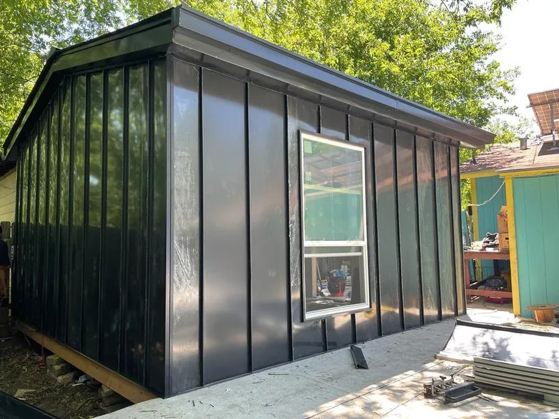 Black standing seam metal wall panels for Metal Roof Installation in University Heights