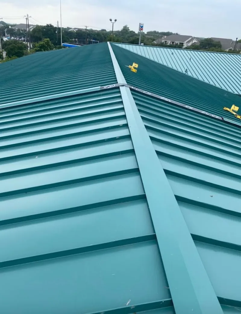 Green commercial metal roof ridge and valley for Metal Roof Repair in University Heights